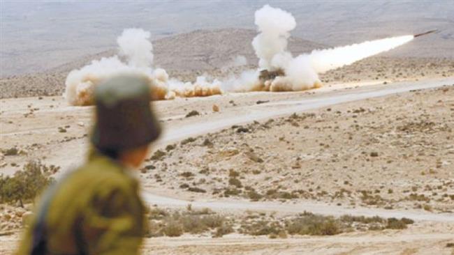 Israeli troops practicing firing missiles in a desert