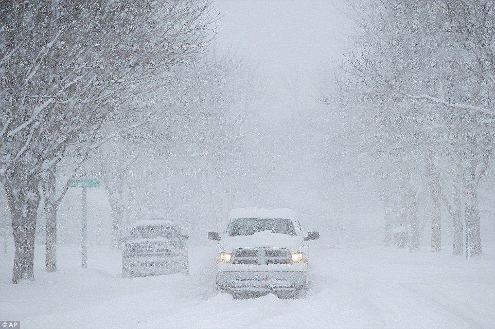 Winter storm Bella dumps 16 inches of snow on the Midwest in the