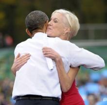 President Barack Obama hugs Planned Parenthood Federation of America President Cecile Richards