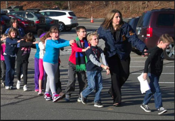 Teacher-leading-students-away-from-Sandy-Hook