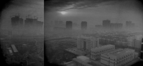 Smog envelopes Xingtai, China, at dawn in southern Hebei province